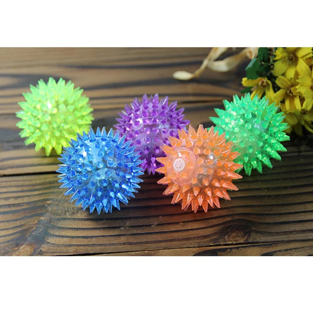 Pelota de goma con sonido para perros, juguete dental